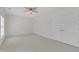 This bedroom features a ceiling fan and carpet flooring at 4622 Ludwell Branch Ct, Raleigh, NC 27612