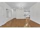 Spacious living room featuring wood floors, neutral walls, and plenty of natural light at 4622 Ludwell Branch Ct, Raleigh, NC 27612