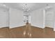 Open-concept living area offers ample space, neutral paint, and hardwood floors at 4622 Ludwell Branch Ct, Raleigh, NC 27612