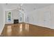 Living area with hardwood floors and ample light from windows and doors at 4622 Ludwell Branch Ct, Raleigh, NC 27612