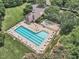 Aerial view of neighborhood pool including kiddie pool and lounge chairs at 4622 Ludwell Branch Ct, Raleigh, NC 27612