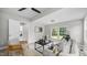 Cozy living room with neutral tones, stylish decor, and natural light from large windows at 505 Hawfields Rd, Mebane, NC 27302