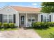 Attractive single-Gathering home with a cozy front porch, well-maintained landscaping, and a welcoming entrance at 5104 Parkerwood Dr, Knightdale, NC 27545