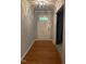 Welcoming entryway featuring hardwood floors, modern lighting, and fresh paint at 512 Crestview Dr, Durham, NC 27712