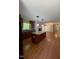 Modern kitchen with stainless steel appliances, granite countertops, and a spacious center island at 512 Crestview Dr, Durham, NC 27712