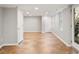 Finished basement with neutral walls, herringbone floors, and a window to the backyard at 5509 Cliffwood Ct, Raleigh, NC 27609