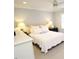 Bedroom featuring natural light, carpet floors, bedside lamps, and soft bedding creating a relaxing atmosphere at 5509 Cliffwood Ct, Raleigh, NC 27609