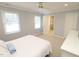 Bedroom featuring natural light with carpet flooring, ceiling fan, with attached bath at 5509 Cliffwood Ct, Raleigh, NC 27609