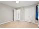 Spacious bedroom with closet, neutral carpet, and lots of light at 5509 Cliffwood Ct, Raleigh, NC 27609