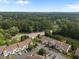 Community aerial view of townhomes with lush trees at 5515 South Roxboro # 32, Durham, NC 27713