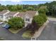 An aerial view showing the townhome's position in a green, landscaped community at 5515 South Roxboro # 32, Durham, NC 27713