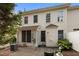 Private back patio with outdoor seating and beautiful landscaping, perfect for relaxation at 5515 South Roxboro # 32, Durham, NC 27713