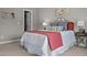 Cozy bedroom features a bed with an upholstered headboard, plush pillows, and a side table at 5515 South Roxboro # 32, Durham, NC 27713
