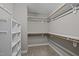 Walk-in closet featuring wood shelving and plenty of space at 5515 South Roxboro # 32, Durham, NC 27713