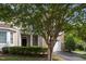 Charming exterior view with manicured shrubs, well-maintained lawn, and an inviting entrance at 5515 South Roxboro # 32, Durham, NC 27713