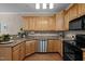 Well-equipped kitchen with ample cabinet space, granite countertops, and hardwood flooring at 5515 South Roxboro # 32, Durham, NC 27713