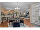 Open-concept living space showcasing dining area, living room, and modern kitchen at 5515 South Roxboro # 32, Durham, NC 27713