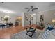 Open layout featuring living room, dining area, and kitchen with hardwood flooring at 5515 South Roxboro # 32, Durham, NC 27713