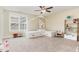 Bright bedroom has a unique bed frame, window and ceiling fan for added comfort at 6 Tulip Tree Ct, Durham, NC 27712