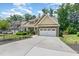 Well-maintained home with a two-car garage and long driveway in a friendly neighborhood at 6 Tulip Tree Ct, Durham, NC 27712