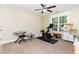 Flex room with carpet, ceiling fan and window is perfect for workout equipment or instruments at 6 Tulip Tree Ct, Durham, NC 27712