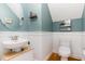 Stylish powder room with modern fixtures, wood look floors and attractive wall color at 6 Tulip Tree Ct, Durham, NC 27712