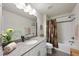 Full bathroom with vanity, shower and bathtub at 605 Smallwood Dr, Durham, NC 27703