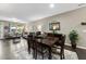 Open-concept dining and living area with hardwood floors and natural light at 605 Smallwood Dr, Durham, NC 27703