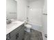 Bathroom with vanity, toilet, and shower-tub combo at 67 Furley St., Homesite 117, Sanford, NC 27330