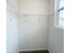 Bright walk-in closet with wire shelving and a window for natural light at 67 Furley St., Homesite 117, Sanford, NC 27330