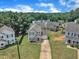 Aerial view of the property showcasing its well-maintained lawn and green surroundings at 71 Herndon Ct, Clayton, NC 27520