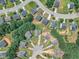Aerial view of a residential area, showcasing homes neatly arranged in a circular pattern at 71 Herndon Ct, Clayton, NC 27520