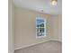 Cozy bedroom with neutral walls and a bright window at 71 Herndon Ct, Clayton, NC 27520
