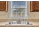 Updated kitchen featuring stainless steel sink and updated countertops at 71 Herndon Ct, Clayton, NC 27520