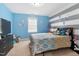 Cheerful bedroom featuring colorful walls, a cozy bed, and plenty of space to relax at 7107 Elkhorn Rd, Rocky Mount, NC 27803