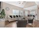 Open-concept living room with vaulted ceilings, wood floors, and stylish furnishings at 7107 Elkhorn Rd, Rocky Mount, NC 27803