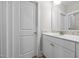 Bathroom vanity featuring stylish fixtures and mosaic tile backsplash at 7410 Chouder Ln, Wake Forest, NC 27587
