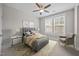 Bedroom with a ceiling fan, rug, and bright natural light at 7410 Chouder Ln, Wake Forest, NC 27587