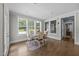 Bright dining room features natural light and a charming round table at 7410 Chouder Ln, Wake Forest, NC 27587