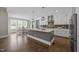 Gourmet kitchen with large center island and stainless steel appliances at 7410 Chouder Ln, Wake Forest, NC 27587
