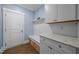 Well-organized mudroom with seating and ample storage at 7410 Chouder Ln, Wake Forest, NC 27587