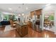 Well-designed kitchen with granite counters, stainless steel appliances and an island for seating at 776 Legend Oaks Dr, Chapel Hill, NC 27517