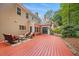 Spacious backyard with plenty of shade and a deck that offers ample room for entertaining at 7808 Sandy Bottom Way, Raleigh, NC 27613