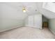Bright bedroom with a ceiling fan and two closets offers ample storage at 7808 Sandy Bottom Way, Raleigh, NC 27613