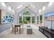 Alternate angle of bonus room with vaulted ceilings, skylights, and views of the landscape at 7808 Sandy Bottom Way, Raleigh, NC 27613