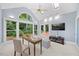 Bright bonus room with vaulted ceilings, skylights, and access to the outdoor deck at 7808 Sandy Bottom Way, Raleigh, NC 27613
