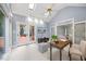 Another view of the bonus room showing skylights, vaulted ceilings, and view of outdoor patio at 7808 Sandy Bottom Way, Raleigh, NC 27613