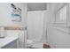 Fresh bathroom showcasing contemporary fixtures, a shower with tub, and a large window at 801 Lincoln Dr, Rocky Mount, NC 27801