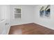 Bright bedroom featuring a window for natural light and hardwood flooring at 801 Lincoln Dr, Rocky Mount, NC 27801