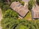 Aerial view of the home with lush trees and private backyard at 809 Davidson Point Rd, Cary, NC 27513